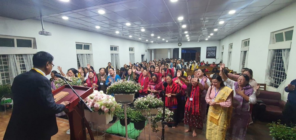 Participants pray during the Nagaland State Assemblies of God women seminar held in Kohima.